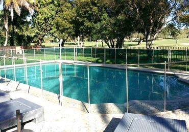 Green/Beige Pool Fence